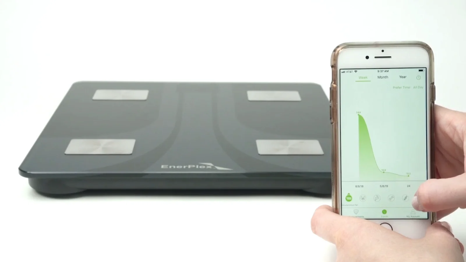 The EnerPlex Fit app logging a weigh-in beside the scale